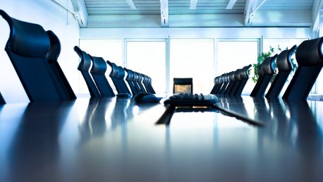 Conference room with large table and many chairs